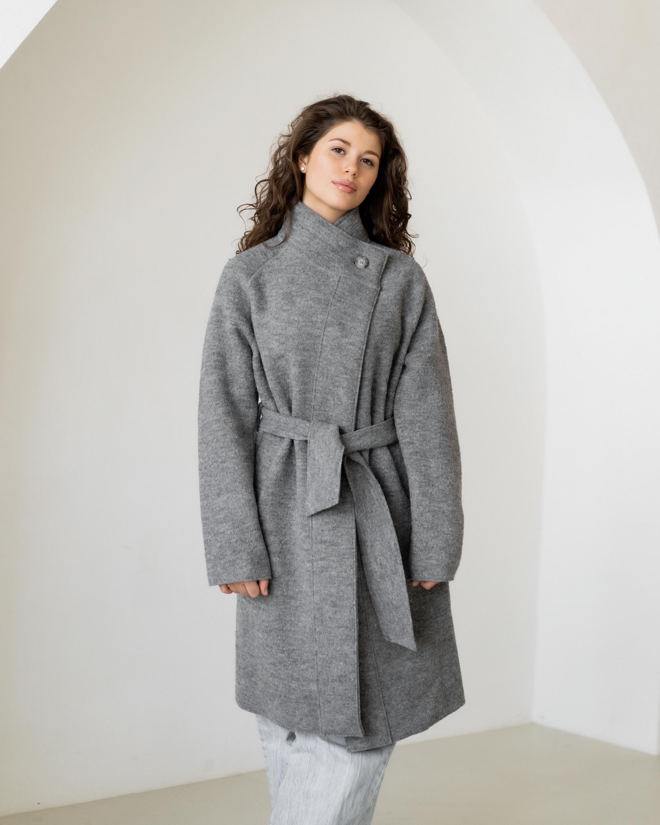 Felted coat with waist belt and button