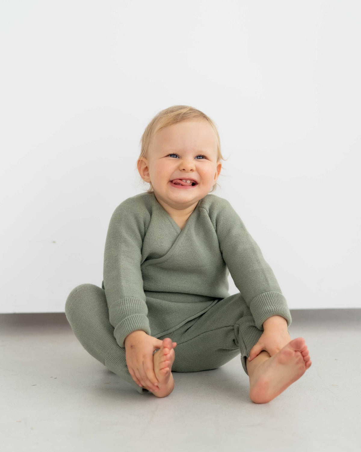Schlüttli – Wickeljacke aus Merino | Baby
