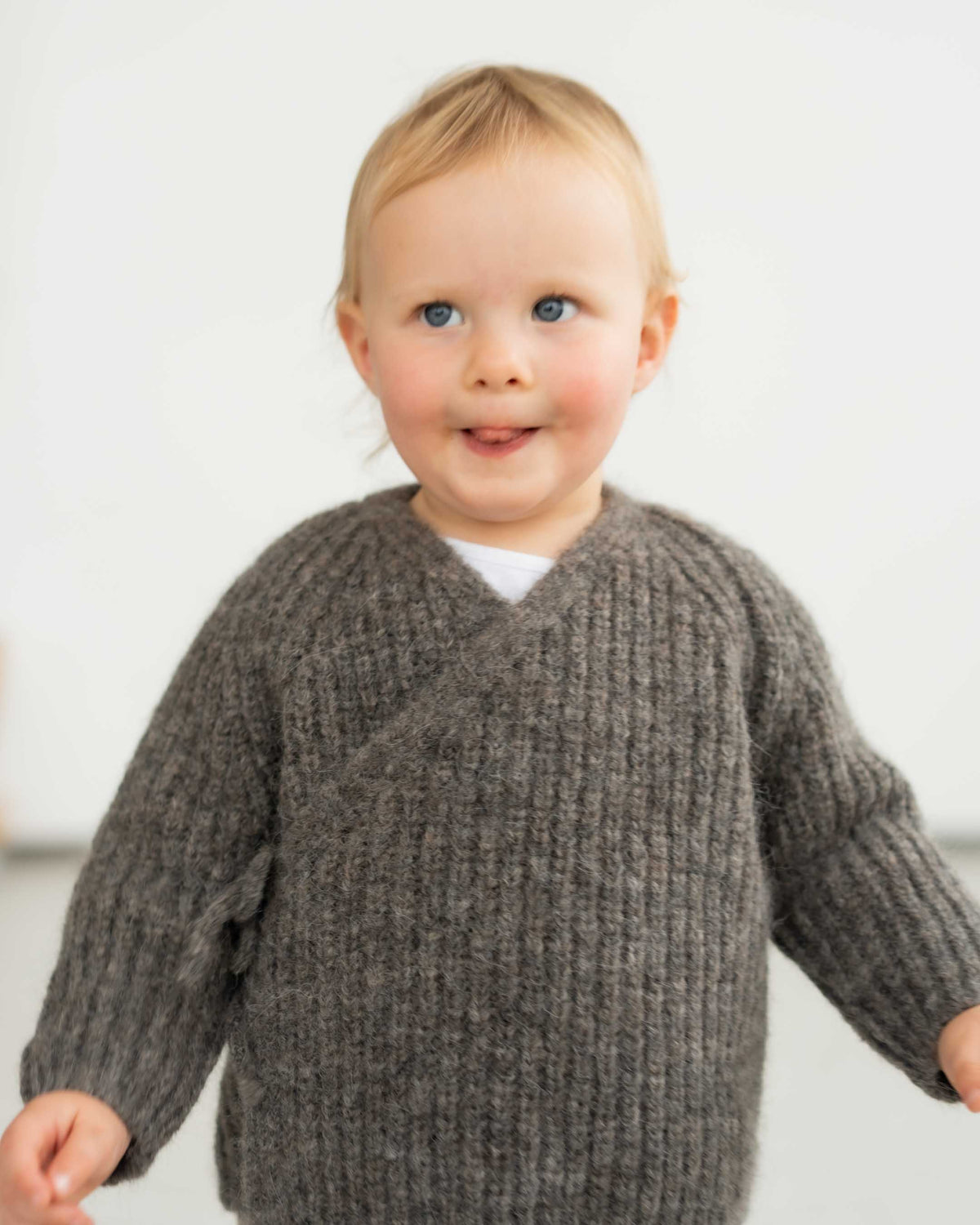 Schlüttli – Wickeljacke aus Alpaka | Baby