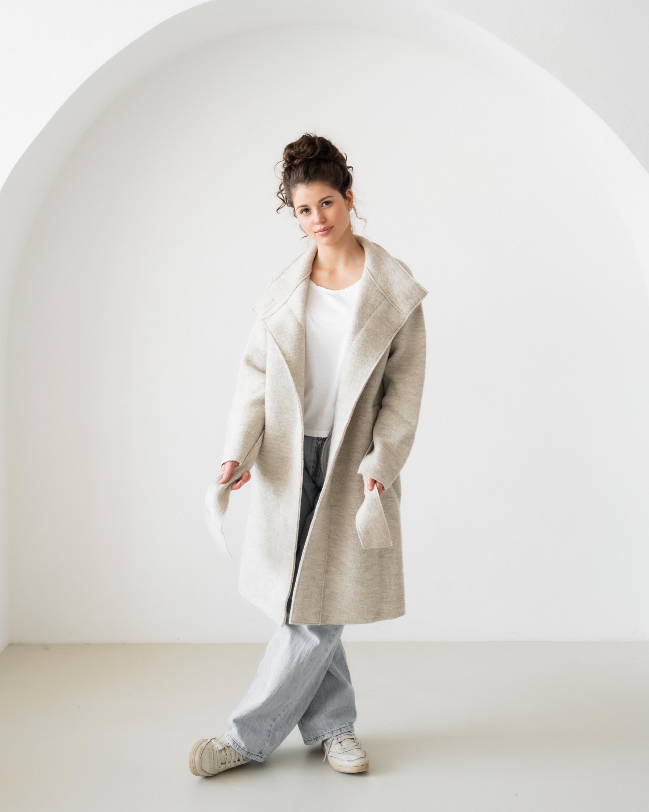 Felted coat with waist belt and button