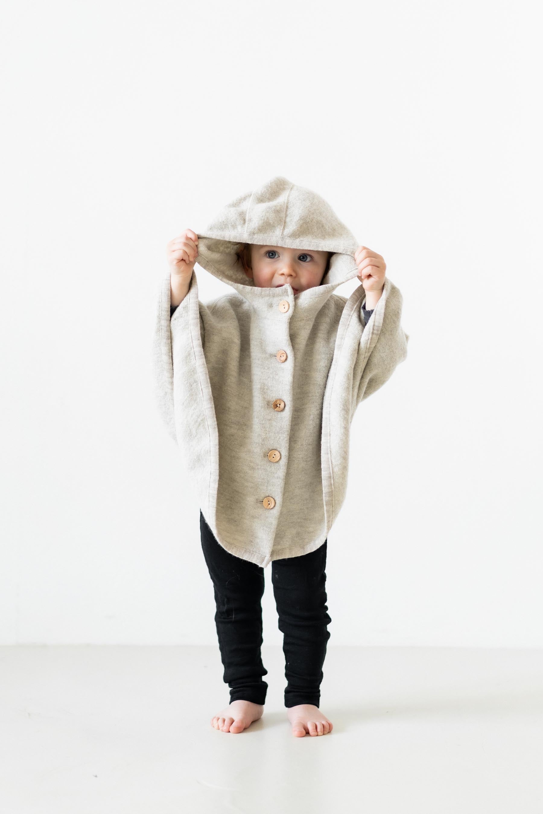 Poncho aus feinem Wollwalk | Baby & Kinder