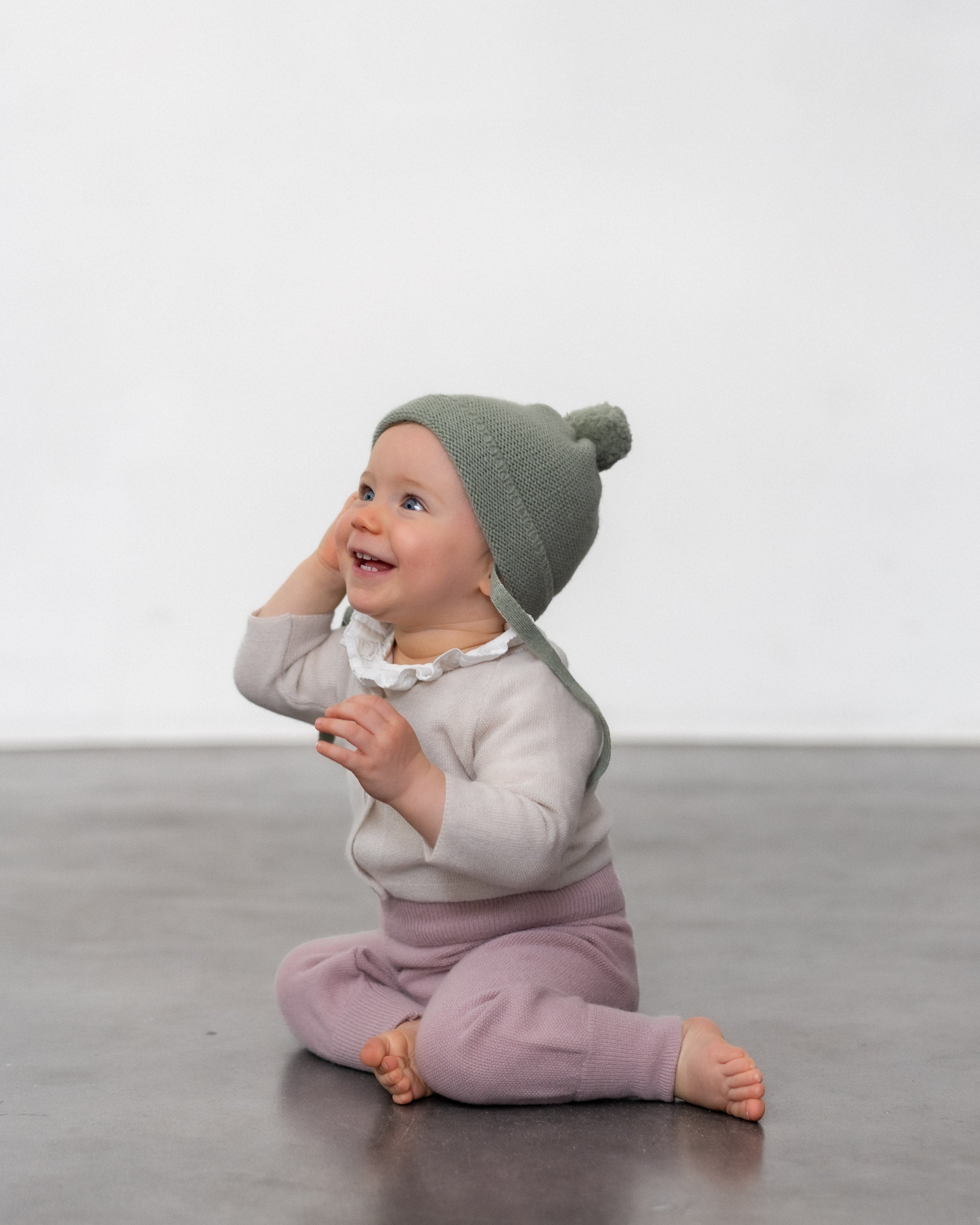 Cashmere Baby Bommelmütze zum Binden