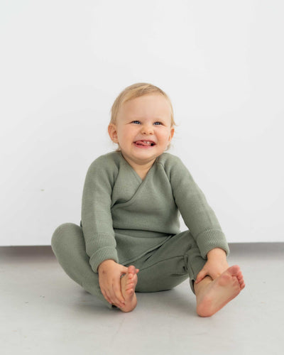 Schlüttli – Wickeljacke aus Merino | Baby