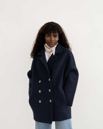 Short women's boiled wool coat with button placket