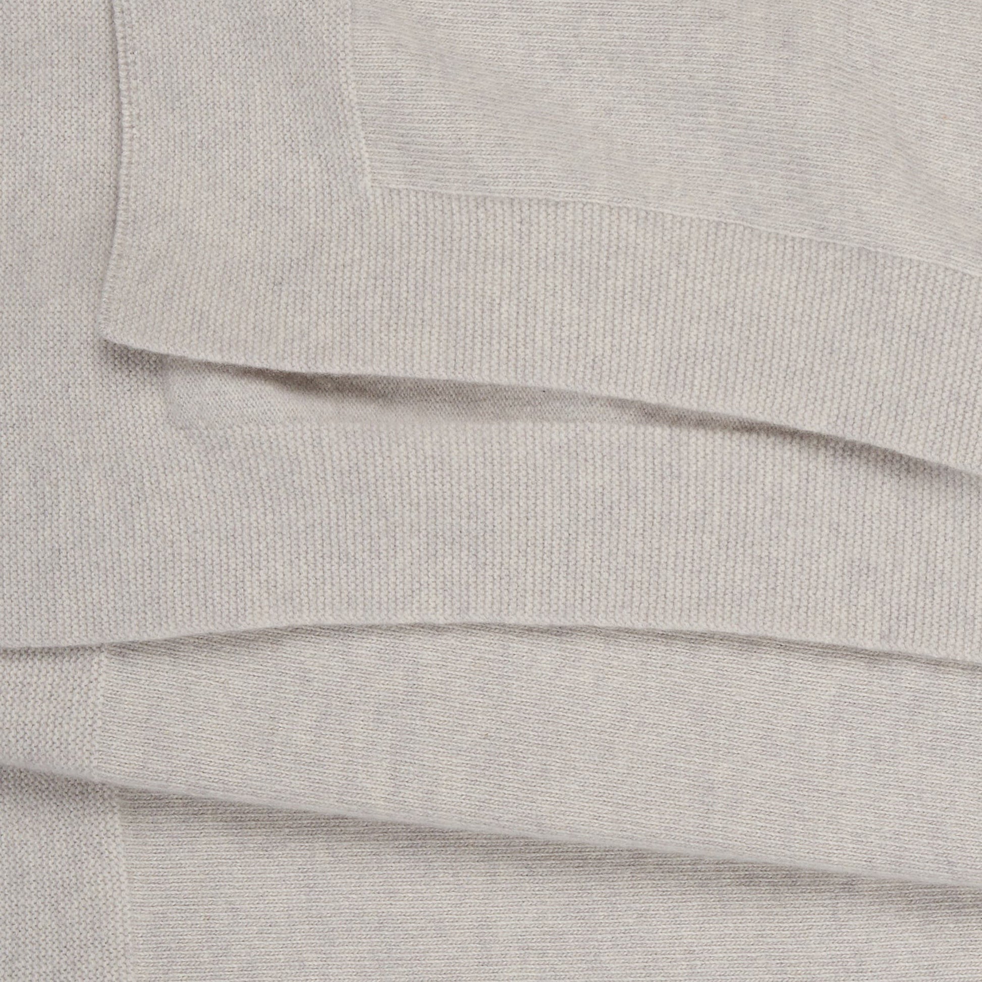 Babydecke aus Schurwolle in Creme im Detail