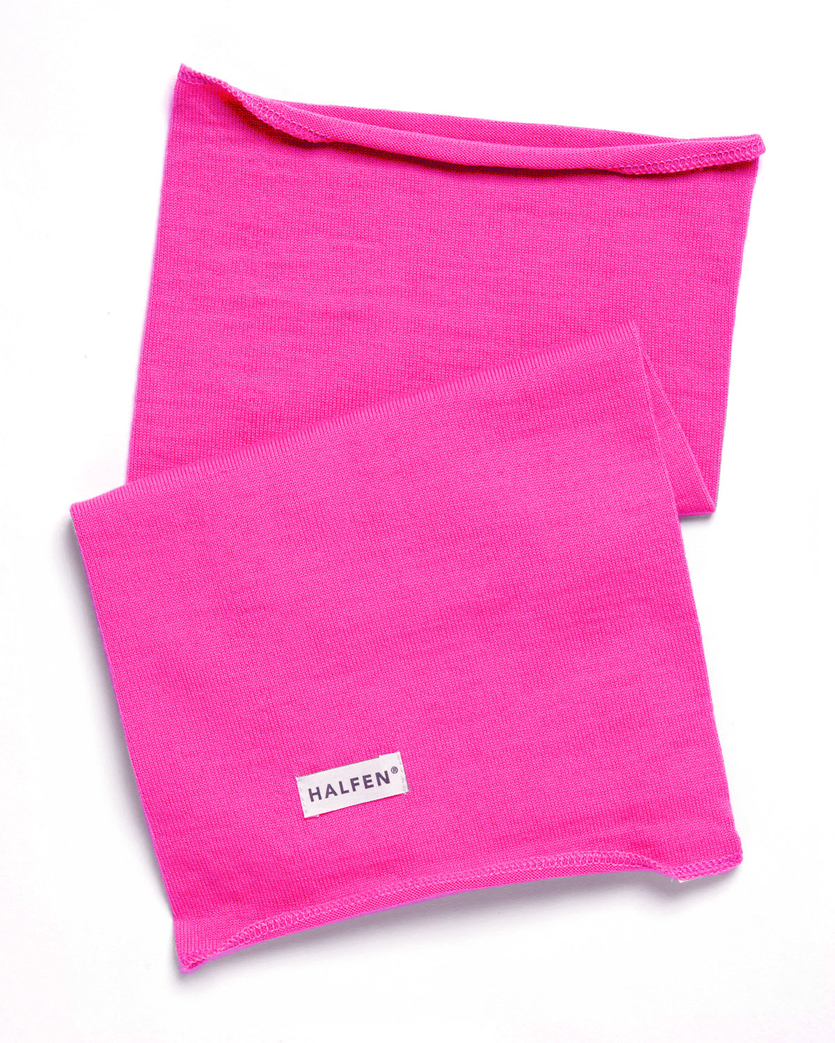 Loop Kinder Schal aus Merinowolle in Neon Pink – gefaltet