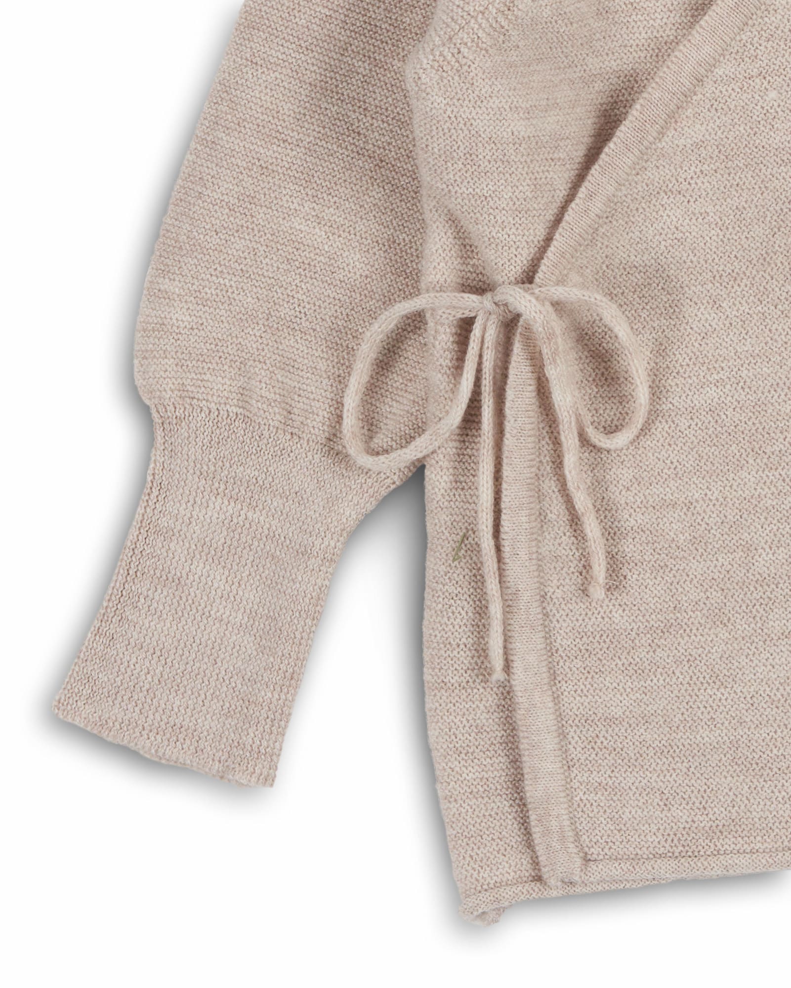 Schlüttli Wickeljacke aus Merinowolle in Natur für Babys im Detail